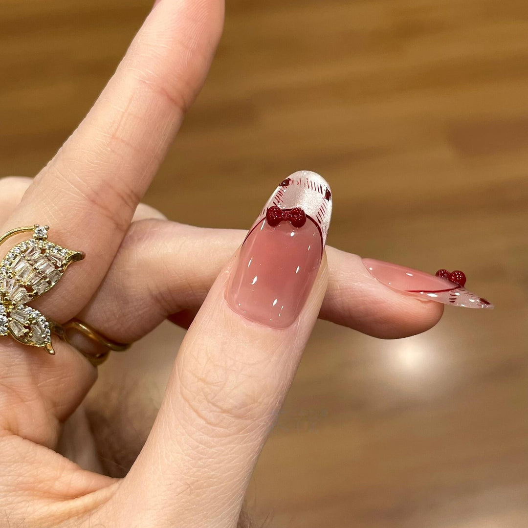 Artificial nails with playful Hello Kitty design Stornfield