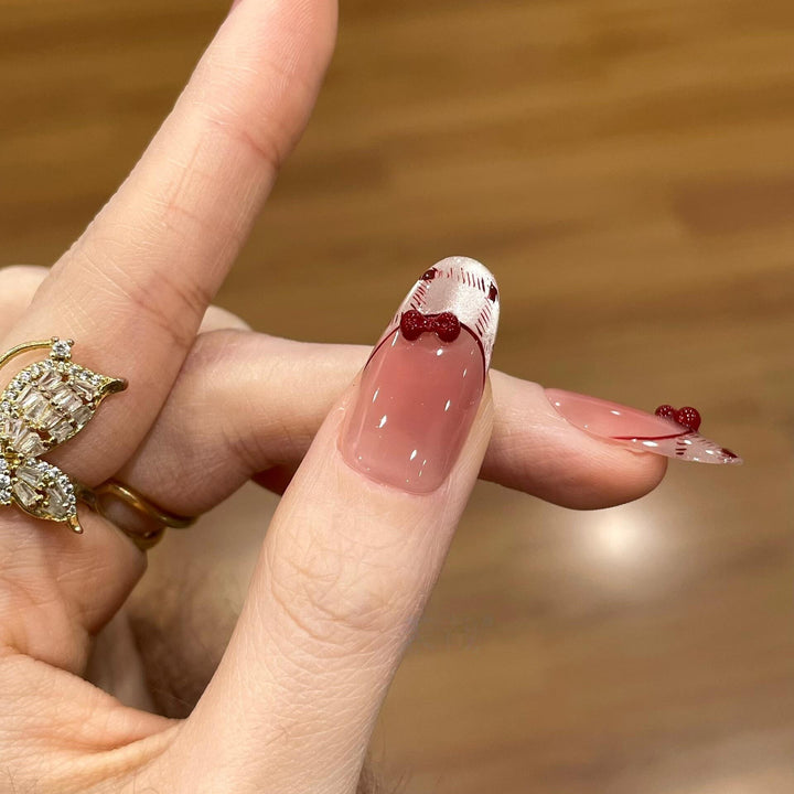 Artificial nails with playful Hello Kitty design Stornfield