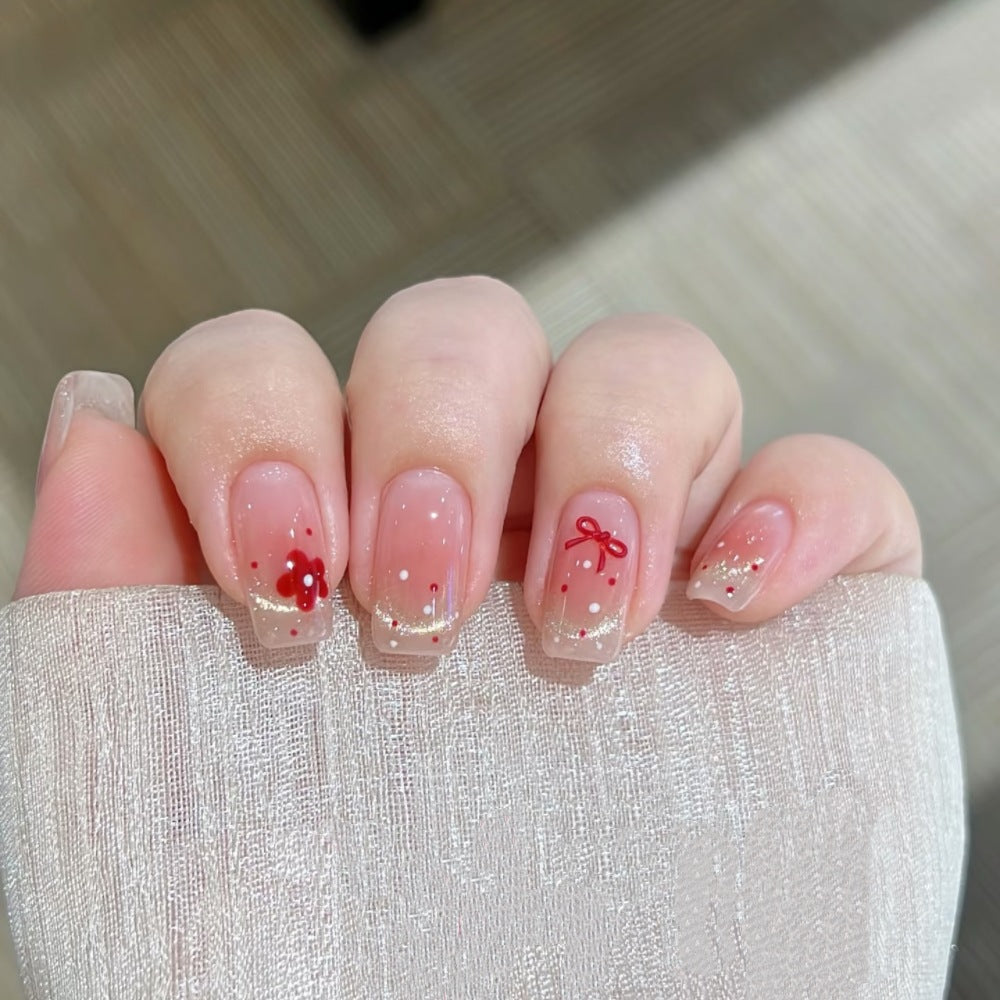Decorative Press-On Nail Set with Floral and Bow Accents Stornfield