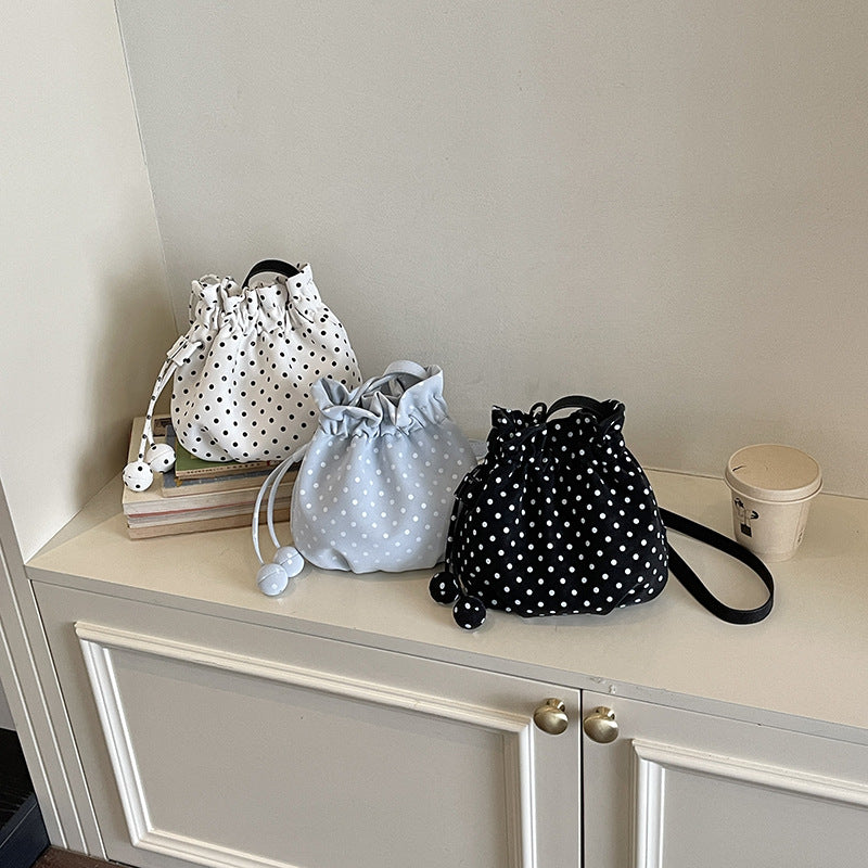 Playful Polka Dot Drawstring Crossbody Bag Stornfield