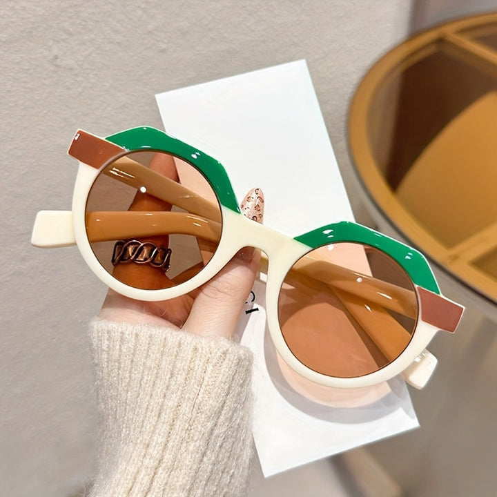Ladies extravagant round sunglasses with colored accented frame Stornfield