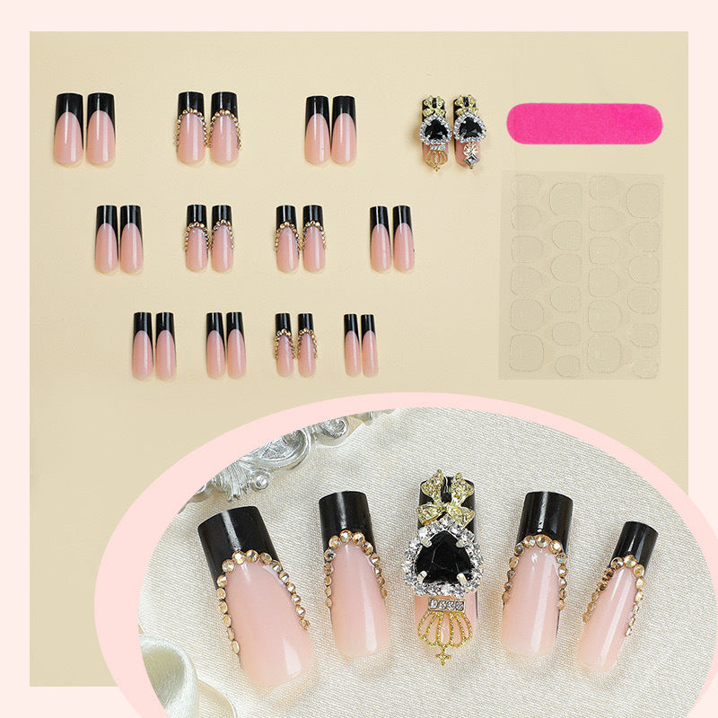 Luxury artificial nail set with sparkling rhinestone decorations and elegant accents Stornfield
