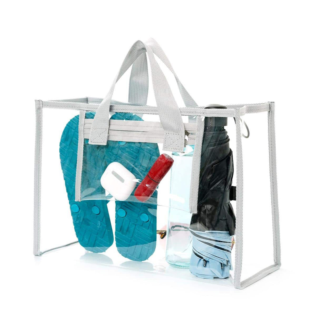 Transparent beach bag with sturdy carrying handles and various compartments Stornfield