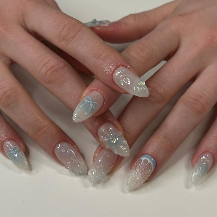 Artificial nail art with floral and decorative elements Stornfield