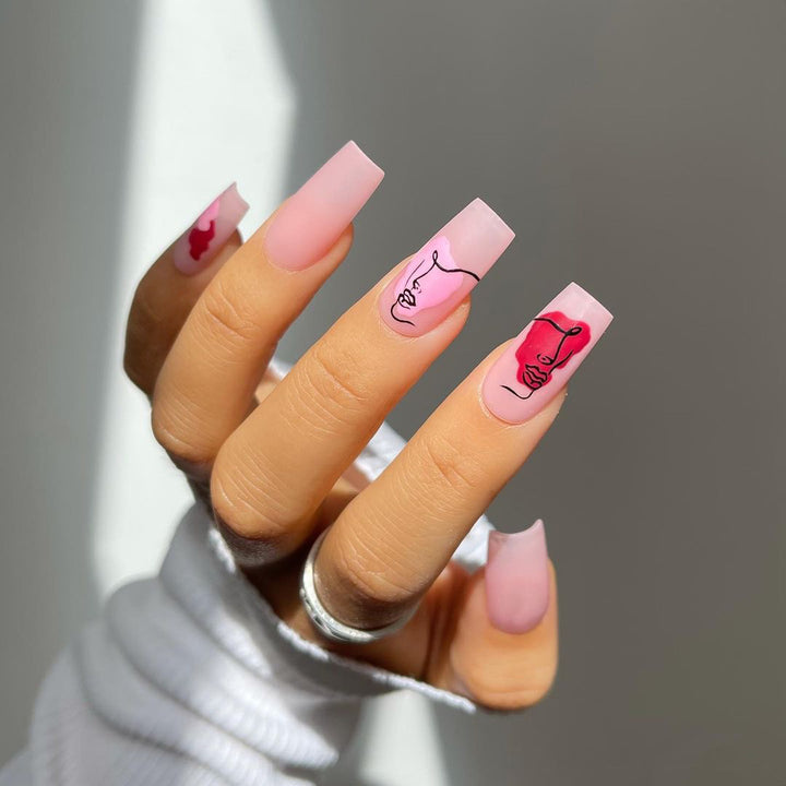Artful Nail Extensions with Abstrahized Face Drawing Stornfield