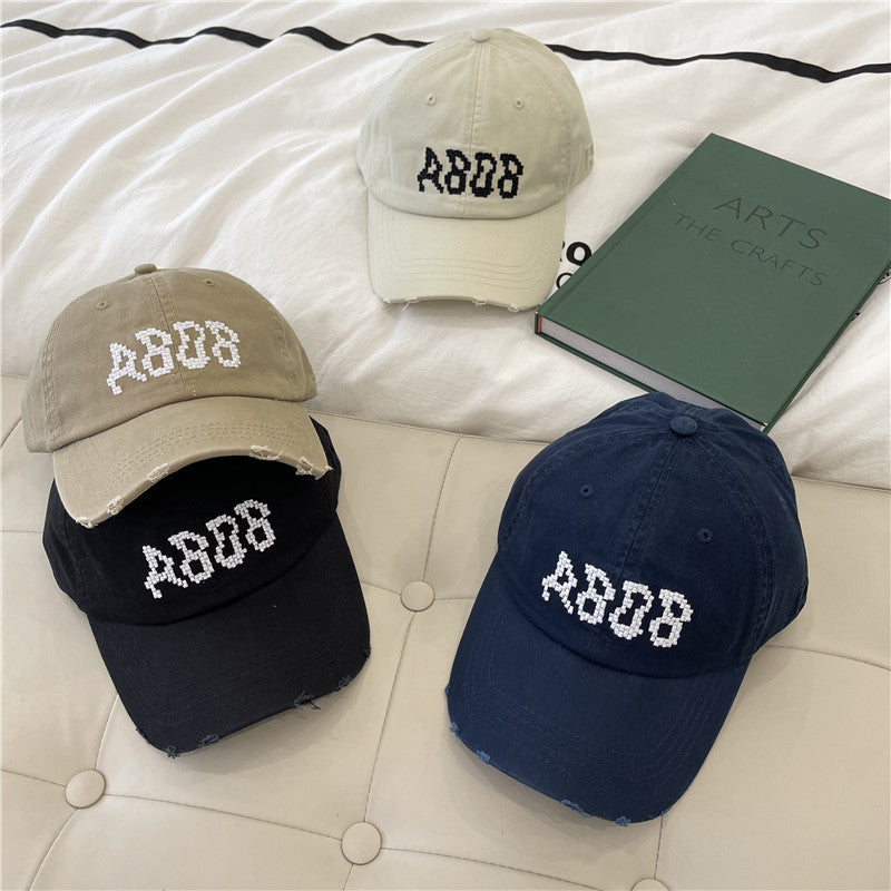 Women's Distressed Cotton Baseball Cap with Graphic Detailing Stornfield