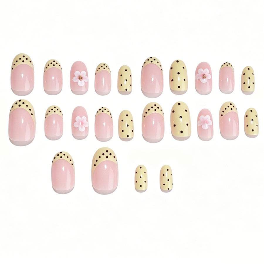 Artificial nail set with a cheerful floral design and elegant accents Stornfield