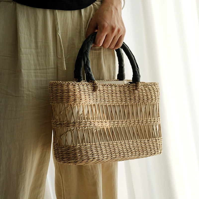 Women's handcrafted tote bag made from sustainable seagrass with stylish handles Stornfield