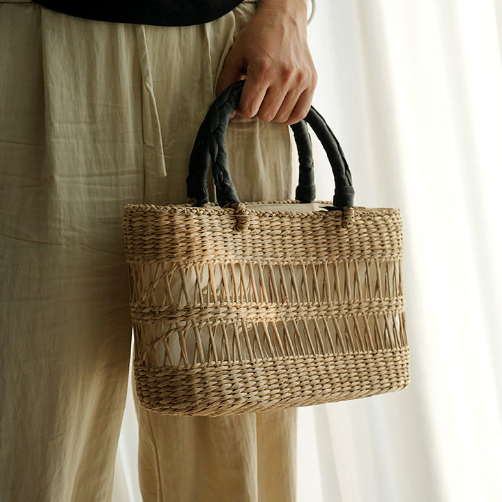 Women's handcrafted tote bag made from sustainable seagrass with stylish handles Stornfield