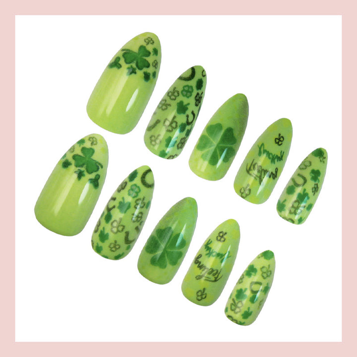 Art nail set with cheerful clover designs and casual lettering motifs Stornfield