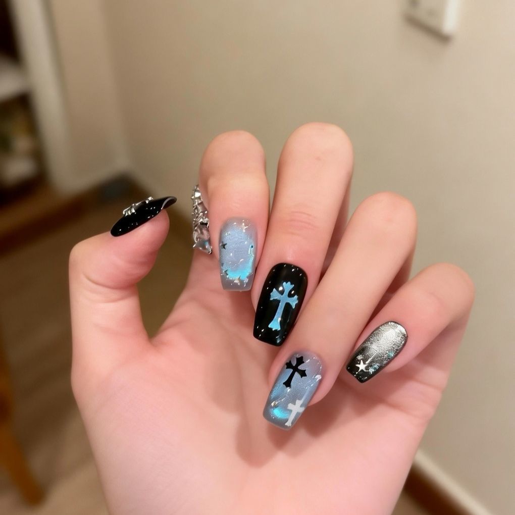 Artistic Press-On Nail Art with Cross and Star Designs