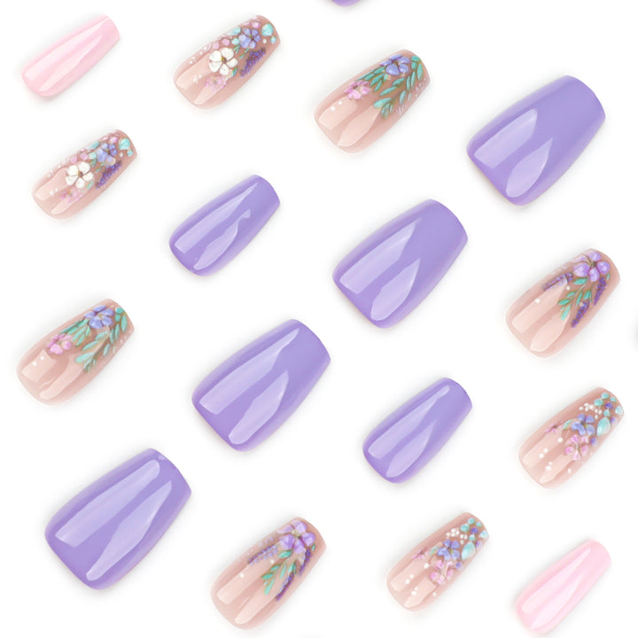 Elegant artificial nail art with delicate flower motifs Stornfield