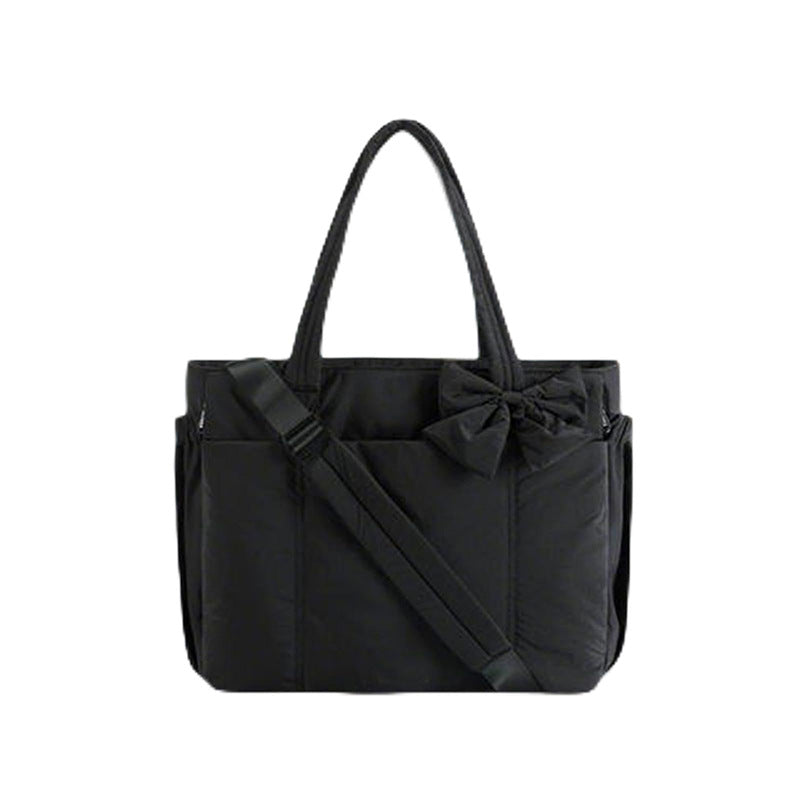 Practical tote bag with retractable shoulder strap and fashionable bow Stornfield