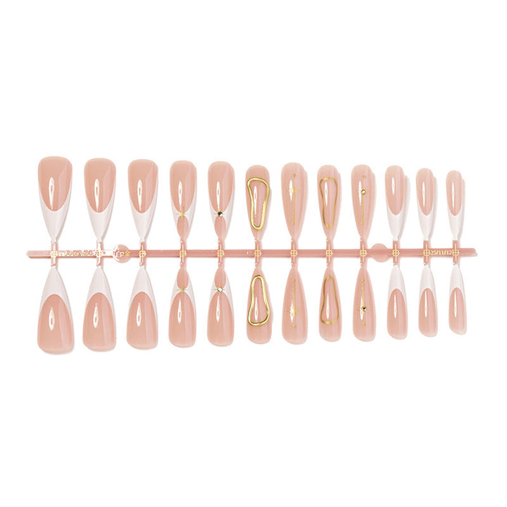 Acrylic nail set with glamorous rhinestones and decorative elements Stornfield