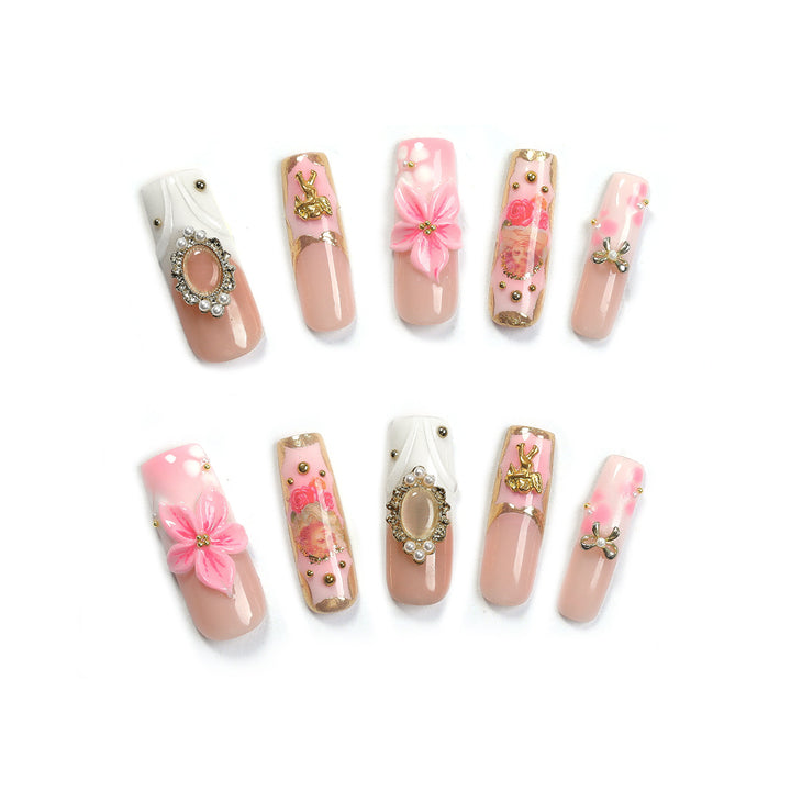 Creative nail art set with blooming decorations and glitter accents Stornfield