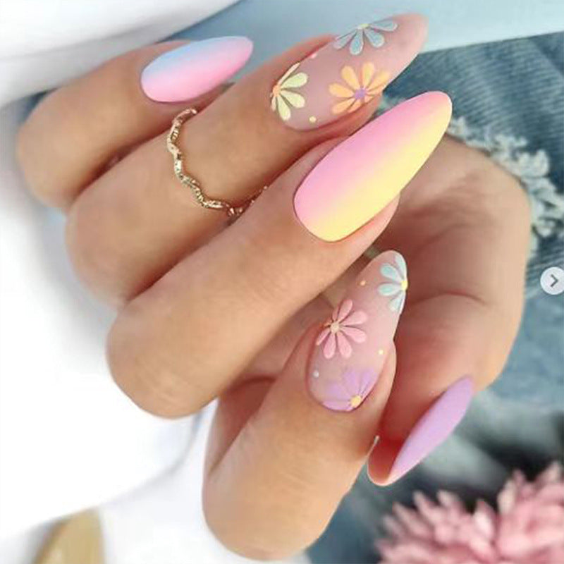 Artistic nail extensions with floral pattern Stornfield