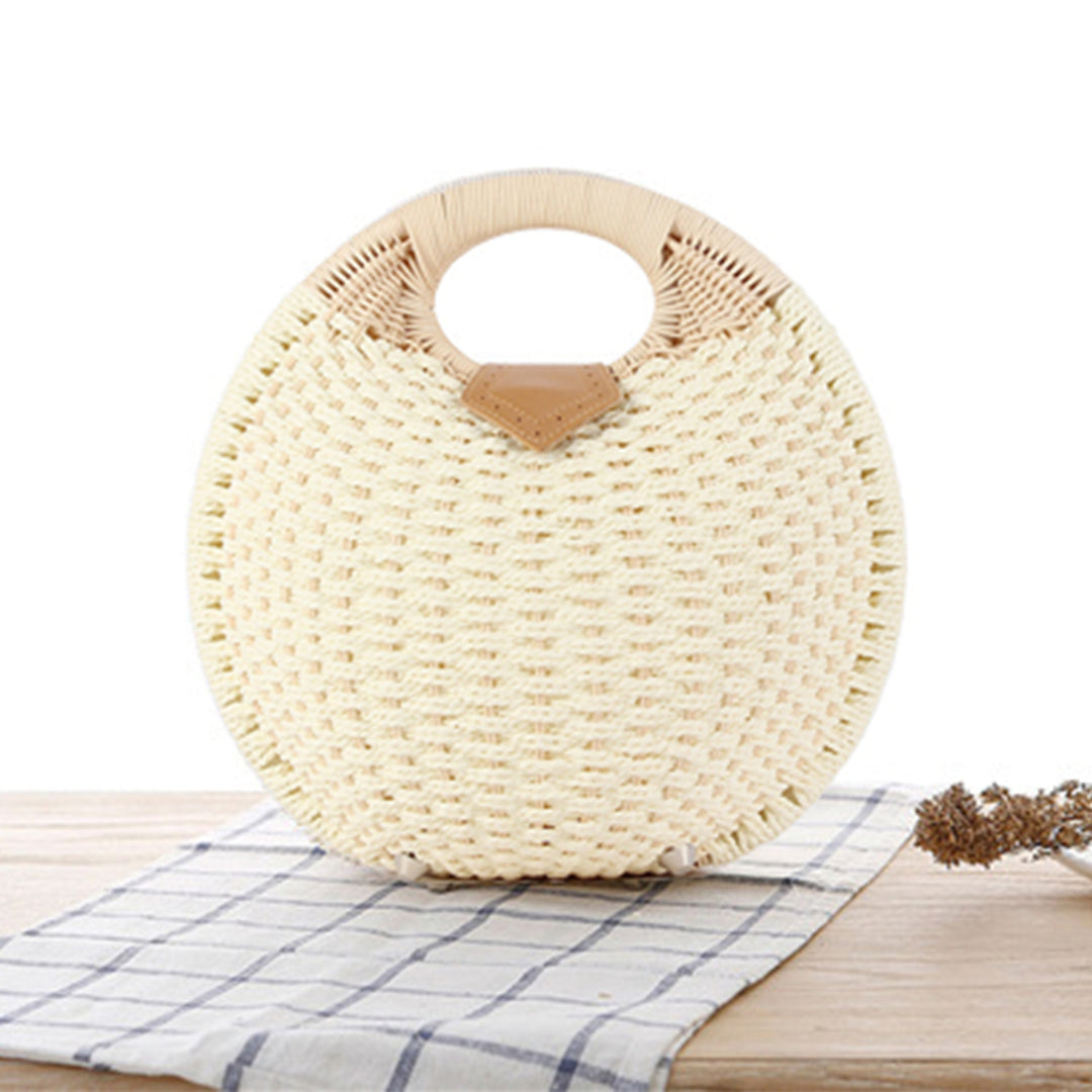 Round straw bag with elegant leather handle Stornfield