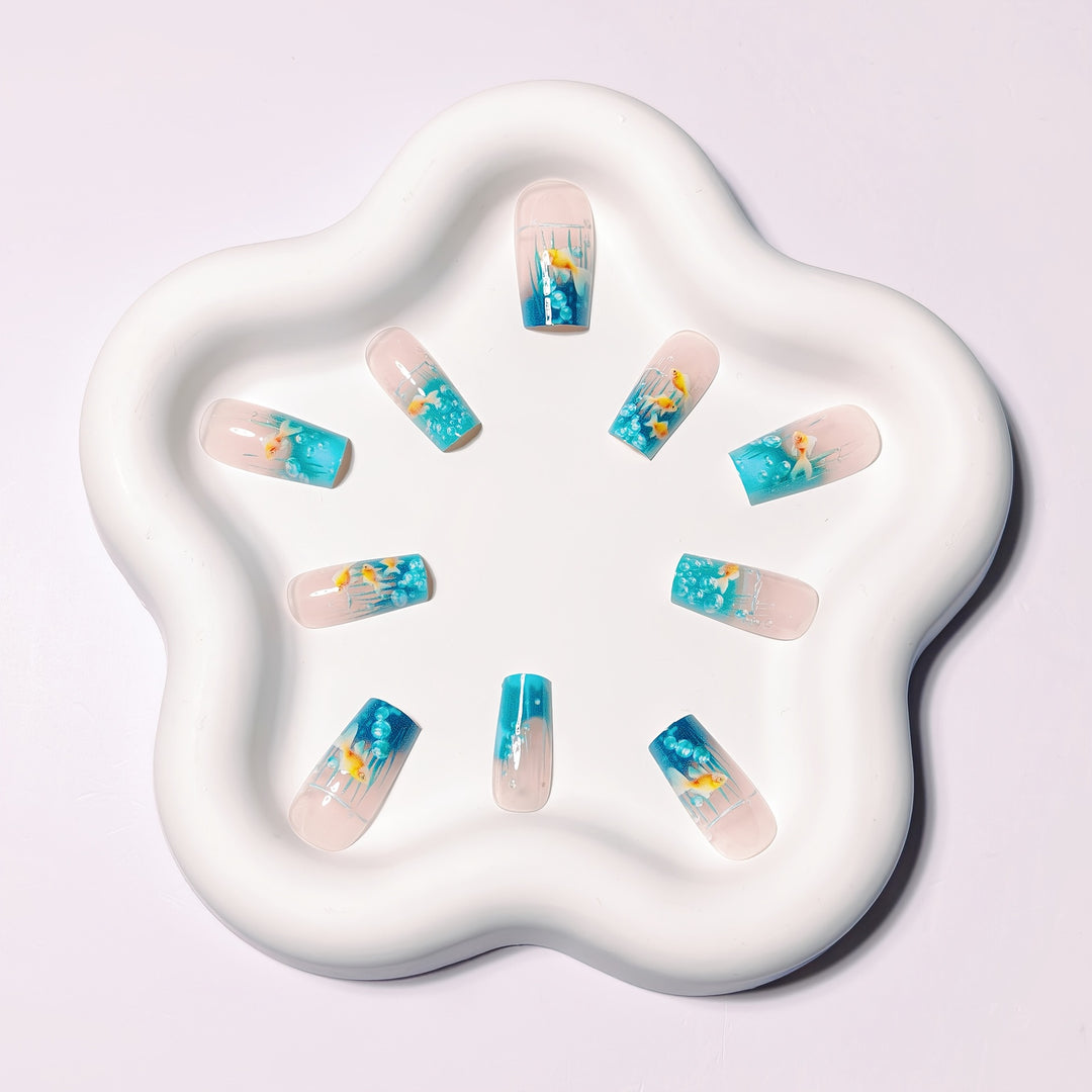 Creative art nails with maritime goldfish design Stornfield