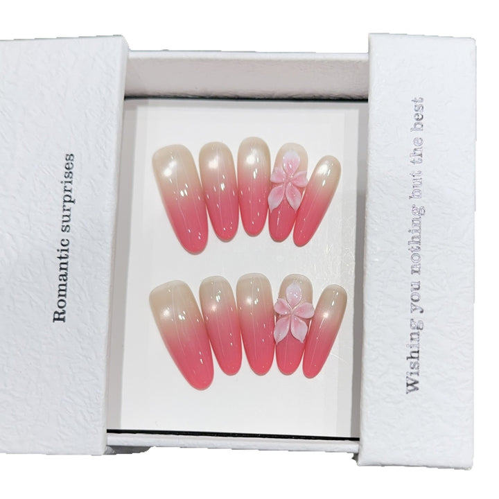 Artificial nails with romantic ombre design and floral accents Stornfield