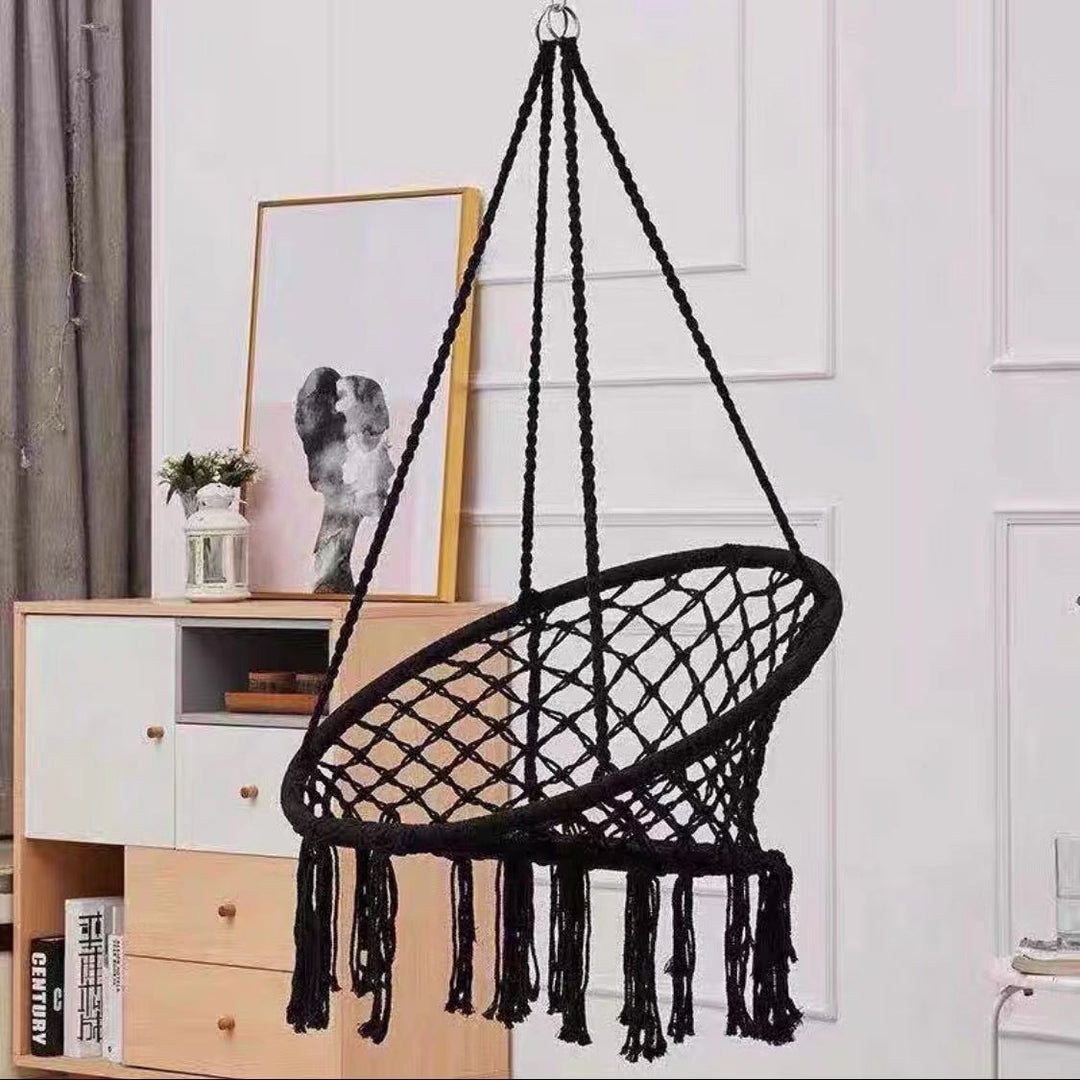 Boho macrame hanging swing chair with faux fur cushion and fringe Stornfield