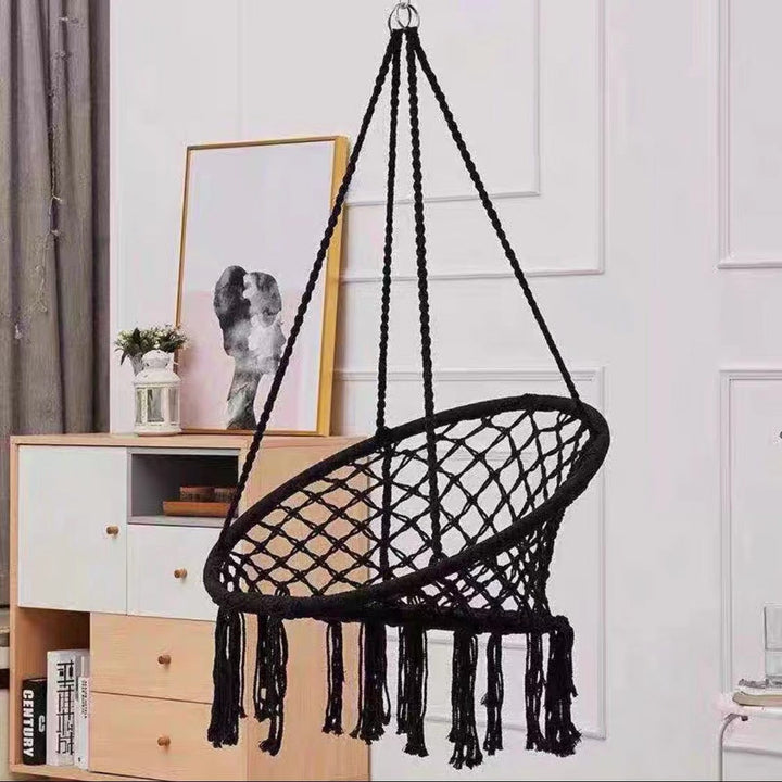 Boho macrame hanging swing chair with faux fur cushion and fringe Stornfield
