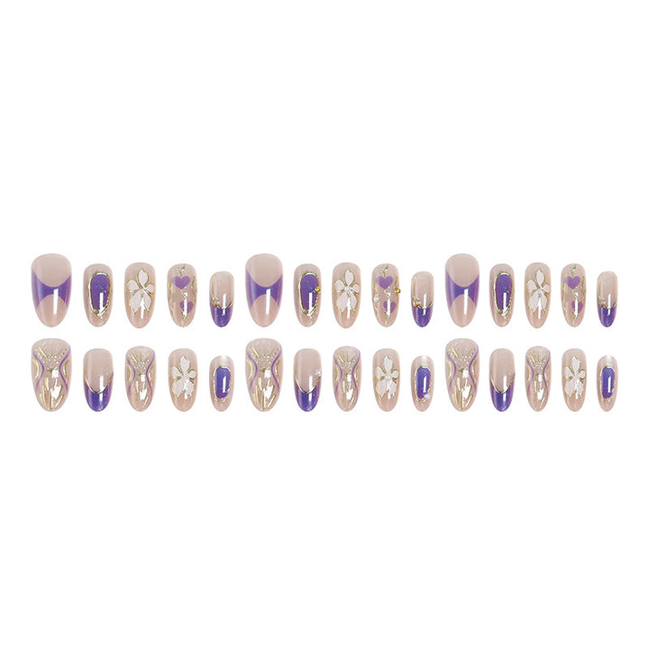 Artificial nail set with elegant flower and glitter details Stornfield