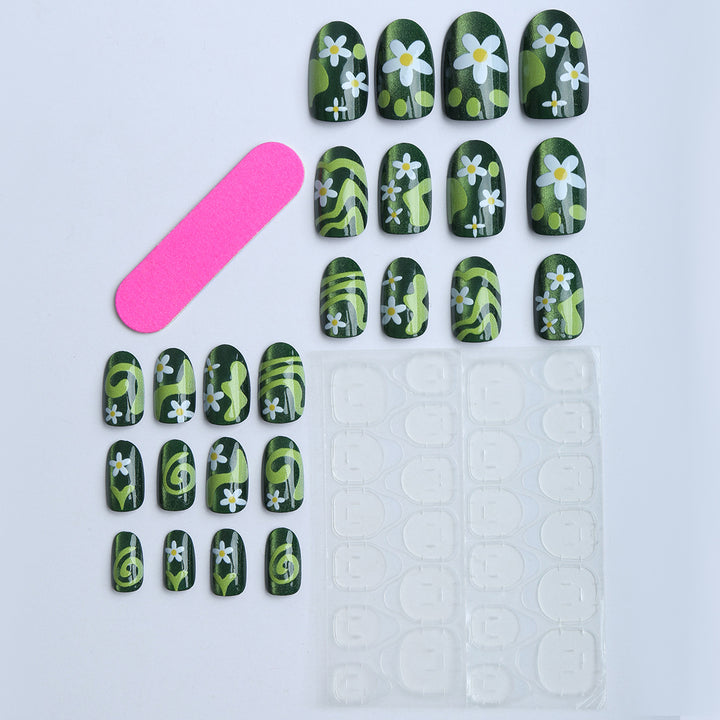 Artificial nails with floral and glittering accents Stornfield