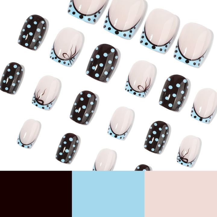 Artful nail extensions with playful dots and elegant design Stornfield