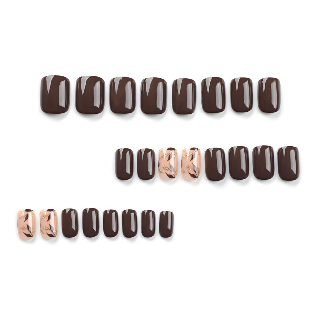 Nail set with elegant marble design and golden accents Stornfield