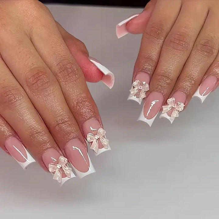 Artificial nail tips with delicate bow decorations Stornfield
