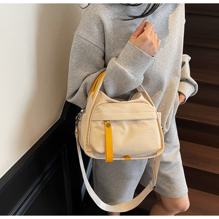 Fashionable shoulder bag with innovative structure and detachable carrying strap Stornfield
