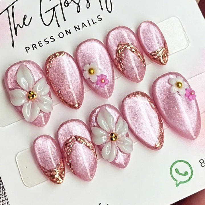 Acrylic nail set with elegant flower and glitter designs Stornfield