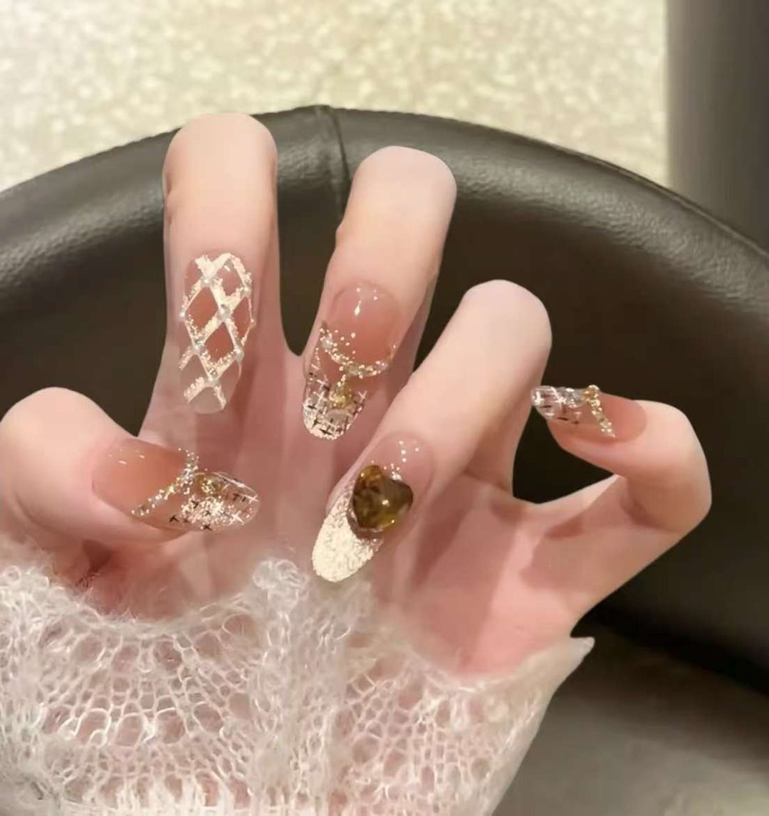 Decorative Long Stiletto Press-On Nails with Heart and Floral Accents Stornfield