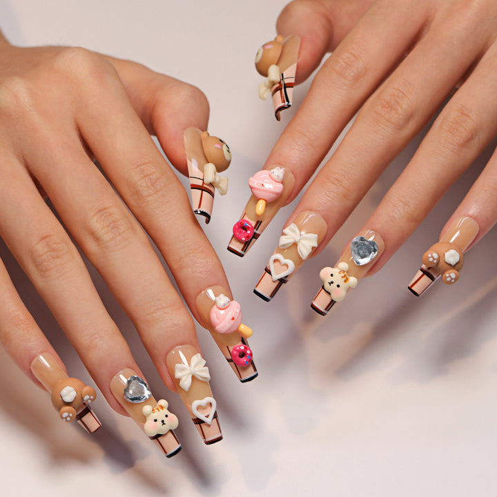 Artificial nail art with cute animal and candy motifs Stornfield
