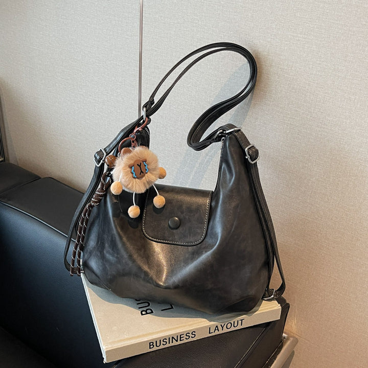 Modern shoulder bag with practical flap closure Stornfield
