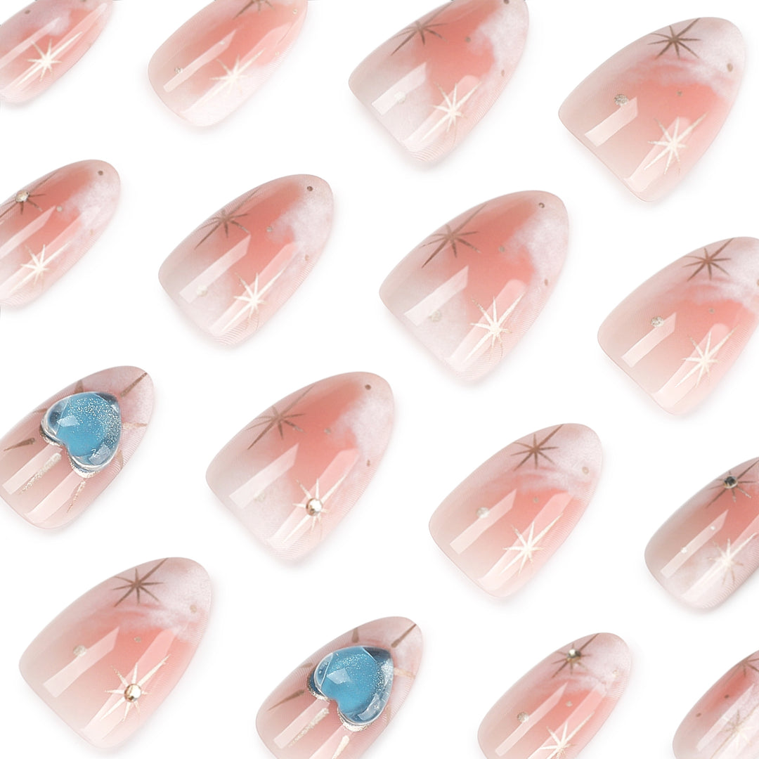 Nail design with decorative hearts and glitter accents Stornfield