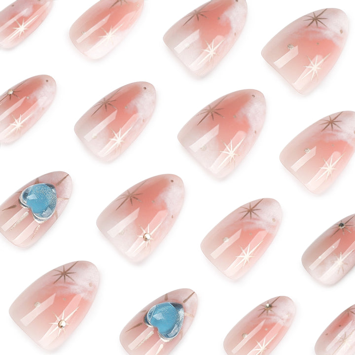 Nail design with decorative hearts and glitter accents Stornfield