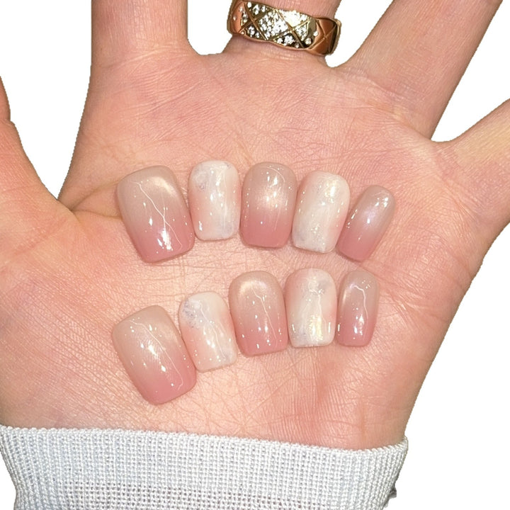 Artificial nails with elegant gradient colors and holographic accents Stornfield