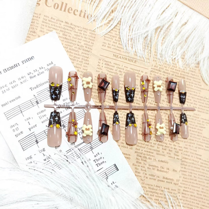 Artificial nails with living bear and gemstone accent Stornfield