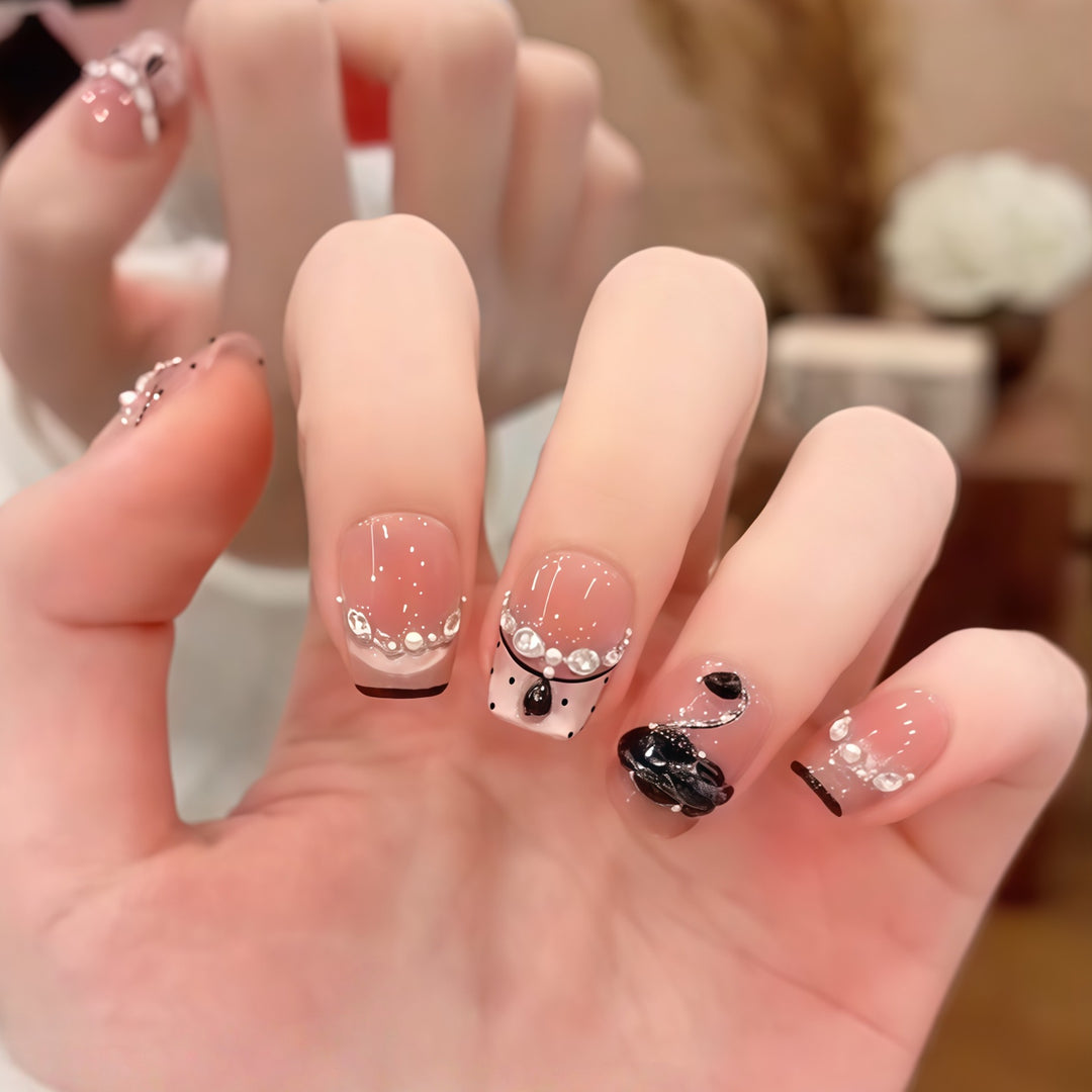 Elegant artificial nails with flower décor and glitter Stornfield