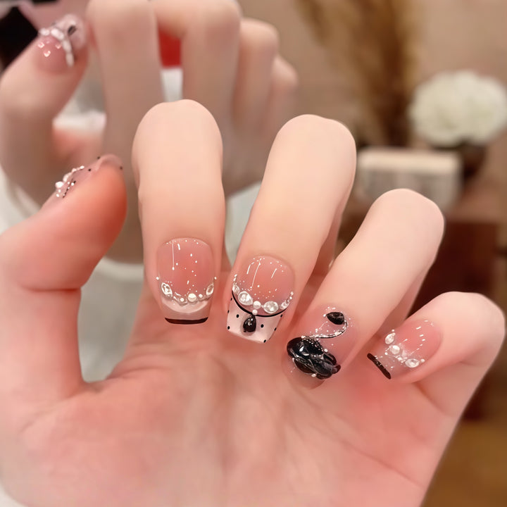 Elegant artificial nails with flower décor and glitter Stornfield