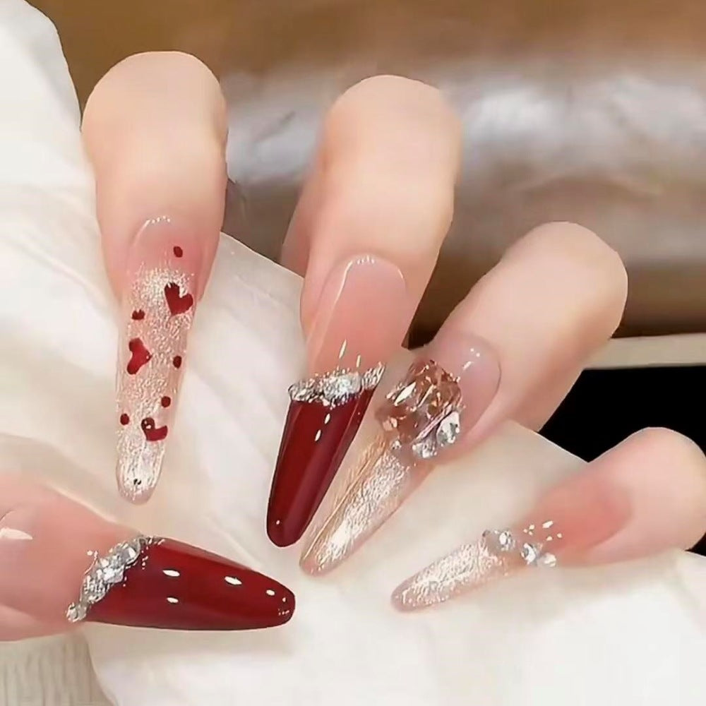 Glamorous Stiletto Nail Art Extensions with Heart Accents