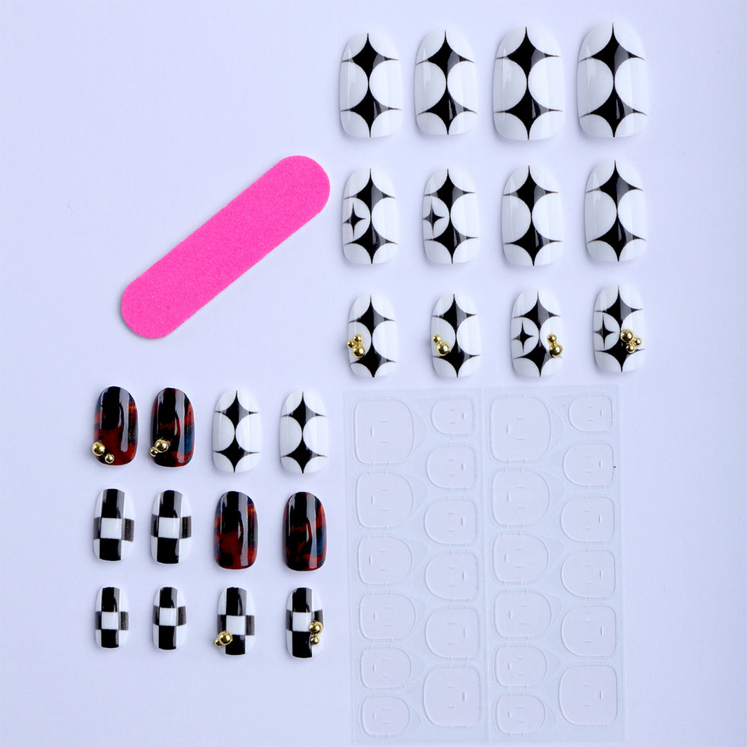 Artificial nails with modern geometric pattern and golden accents Stornfield