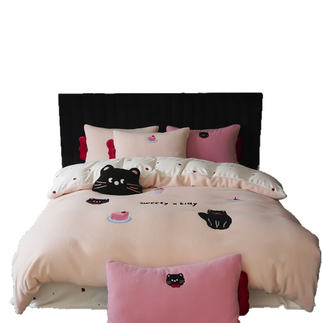Quilted fleece bedding set with dog motifs and paw embroidery.