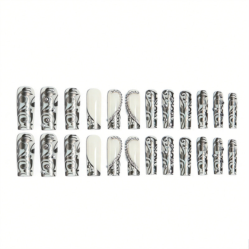 Elegant artificial nails with stylish embellishments Stornfield