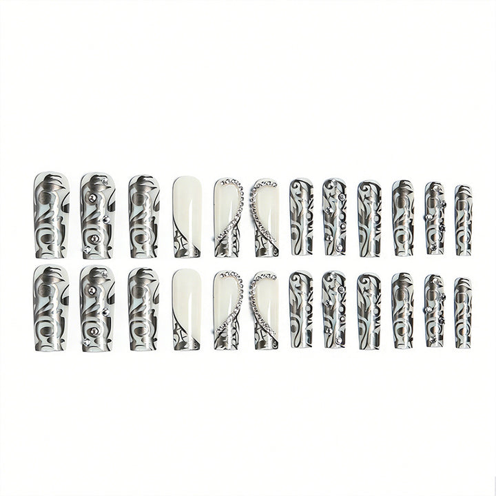 Elegant artificial nails with stylish embellishments Stornfield