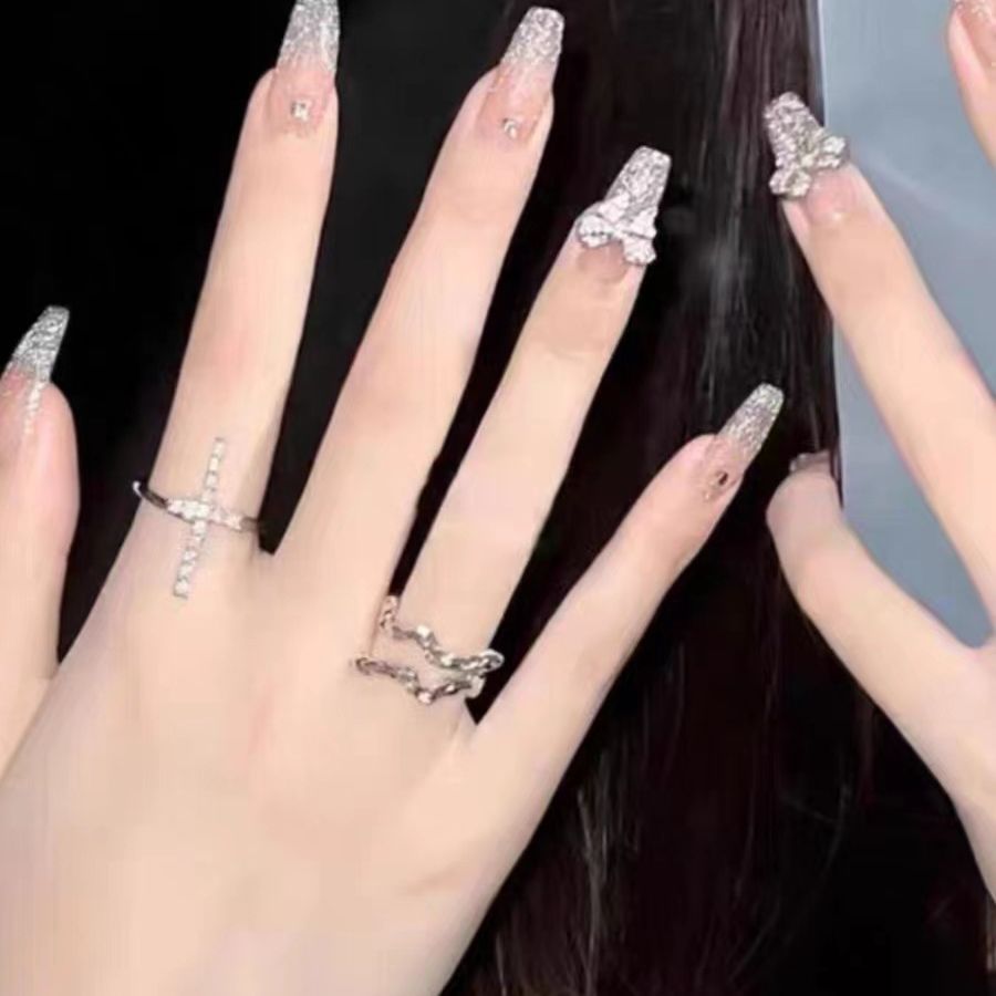 Glamorous artificial nails with sparkling elements