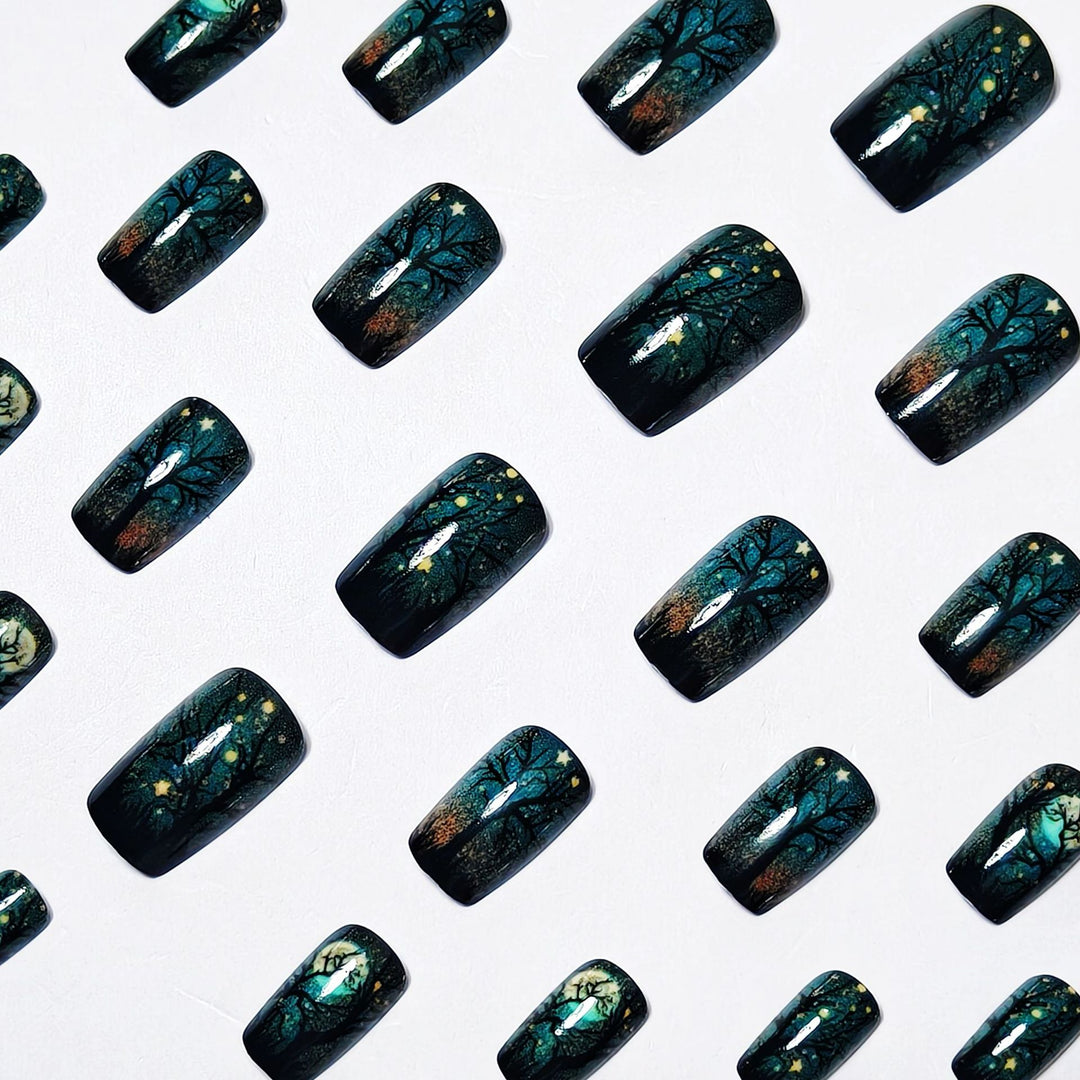Creative Acrylic Nails with Midnight Forest Design Stornfield