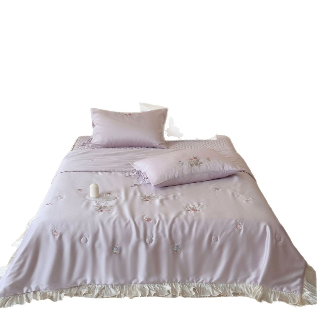 Romantic satin bedding set with ruffle, floral embroidery and tie pillow