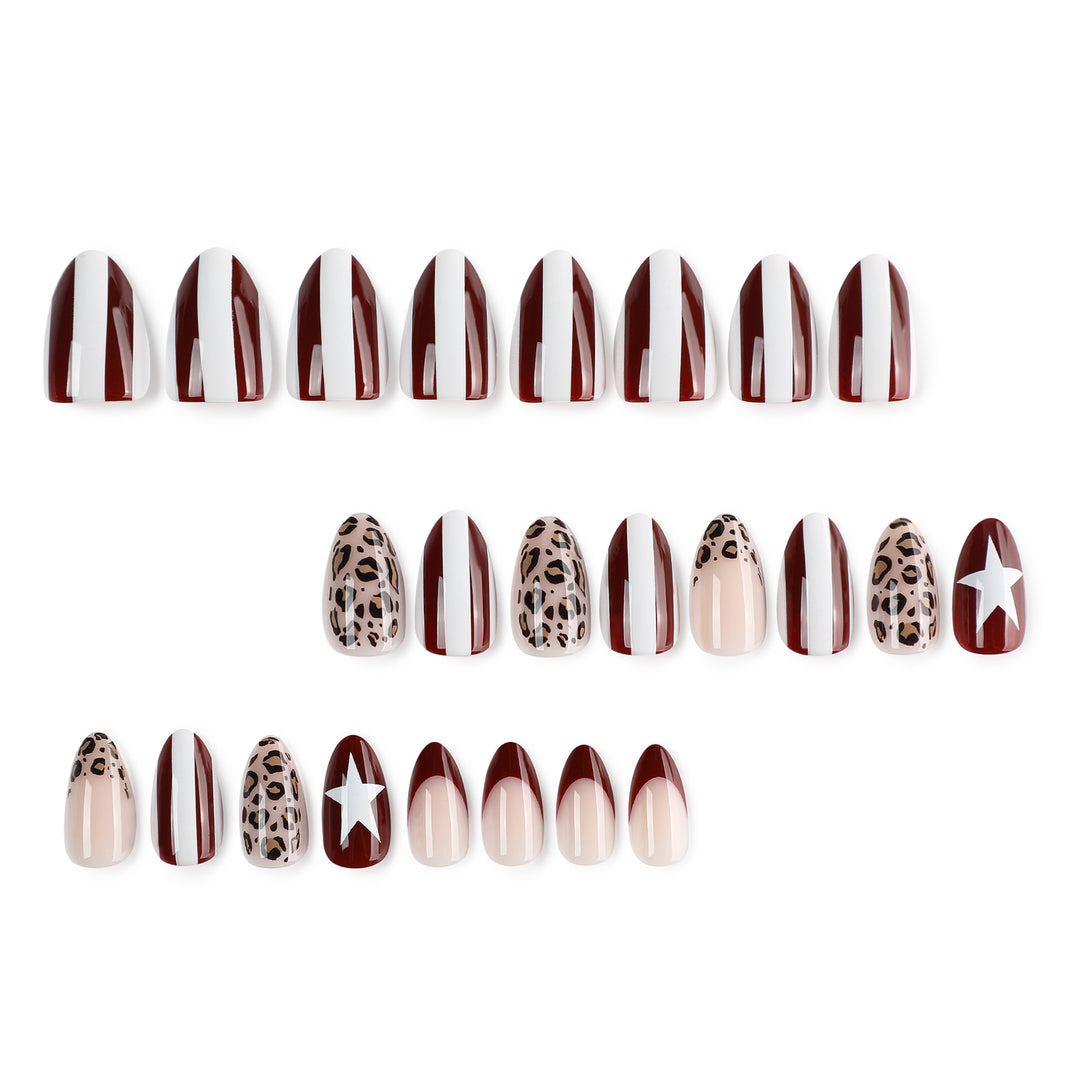 Artful stiletto nails with leopard pattern and elegant glitter decoration Stornfield